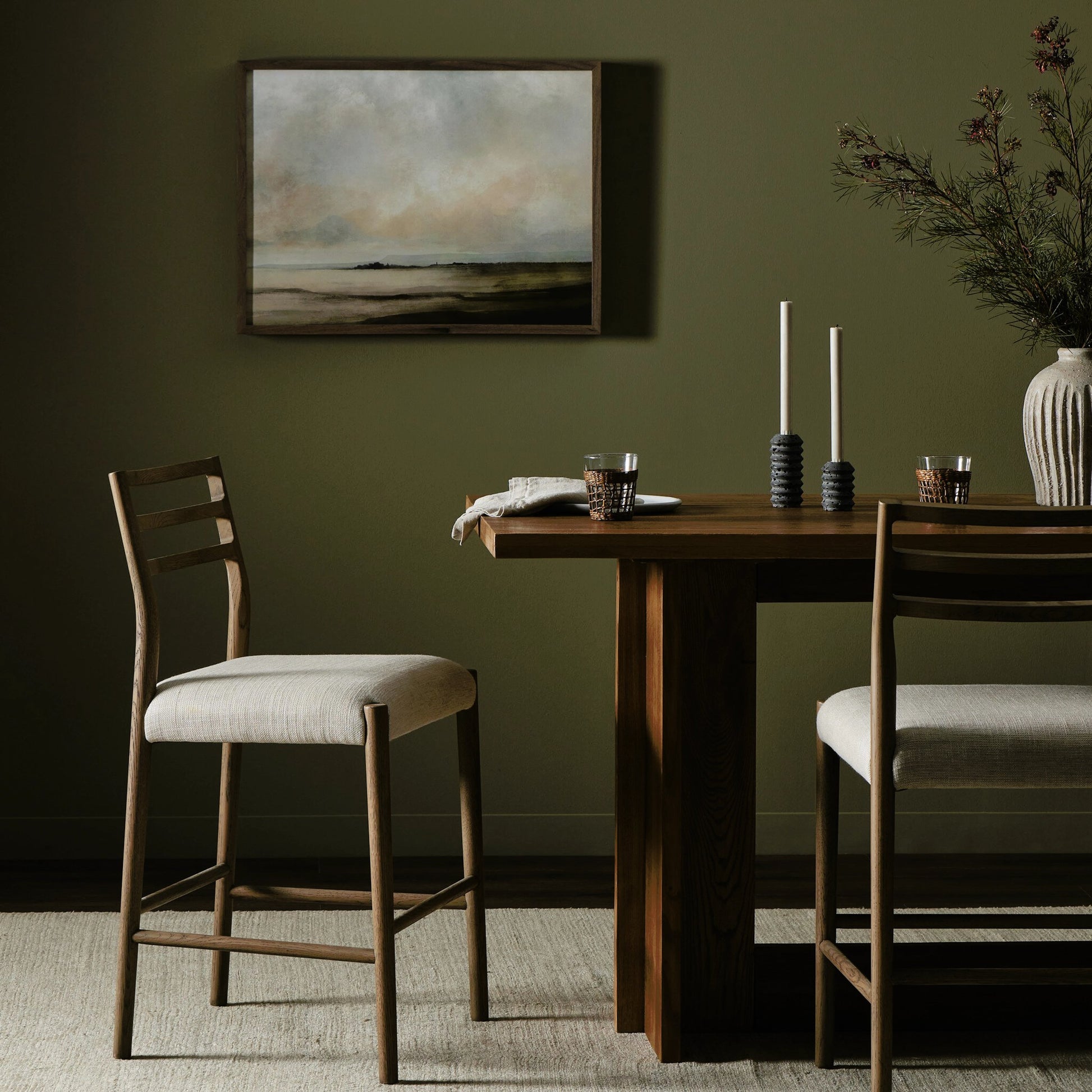 Glenmore Counter Stool by Four Hands in essence natural. Made from 49% viscose (rayon), 22% flax, linen, 18% polyester, 11% cotton, solid oak, 100% polyurethane foam pad in a modern style.