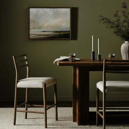 Glenmore Counter Stool by Four Hands in essence natural. Made from 49% viscose (rayon), 22% flax, linen, 18% polyester, 11% cotton, solid oak, 100% polyurethane foam pad in a modern style.