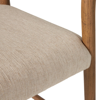 Glenmore Counter Stool by Four Hands in essence natural. Made from 49% viscose (rayon), 22% flax, linen, 18% polyester, 11% cotton, solid oak, 100% polyurethane foam pad in a modern style.