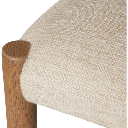 Glenmore Counter Stool by Four Hands in essence natural. Made from 49% viscose (rayon), 22% flax, linen, 18% polyester, 11% cotton, solid oak, 100% polyurethane foam pad in a modern style.