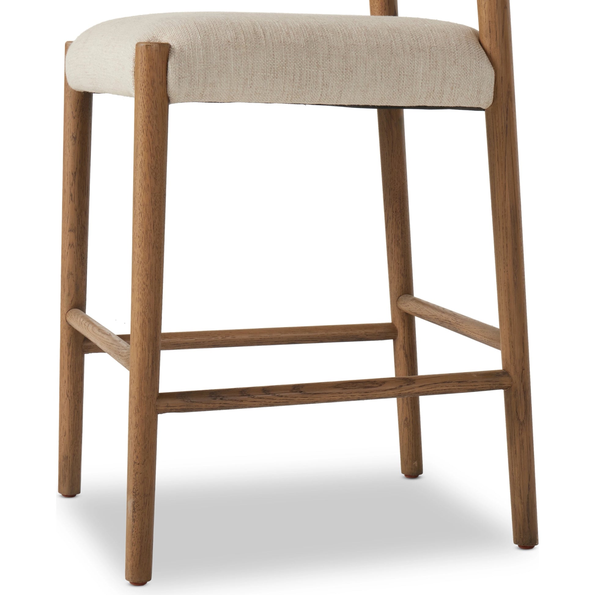 Glenmore Counter Stool by Four Hands in essence natural. Made from 49% viscose (rayon), 22% flax, linen, 18% polyester, 11% cotton, solid oak, 100% polyurethane foam pad in a modern style.