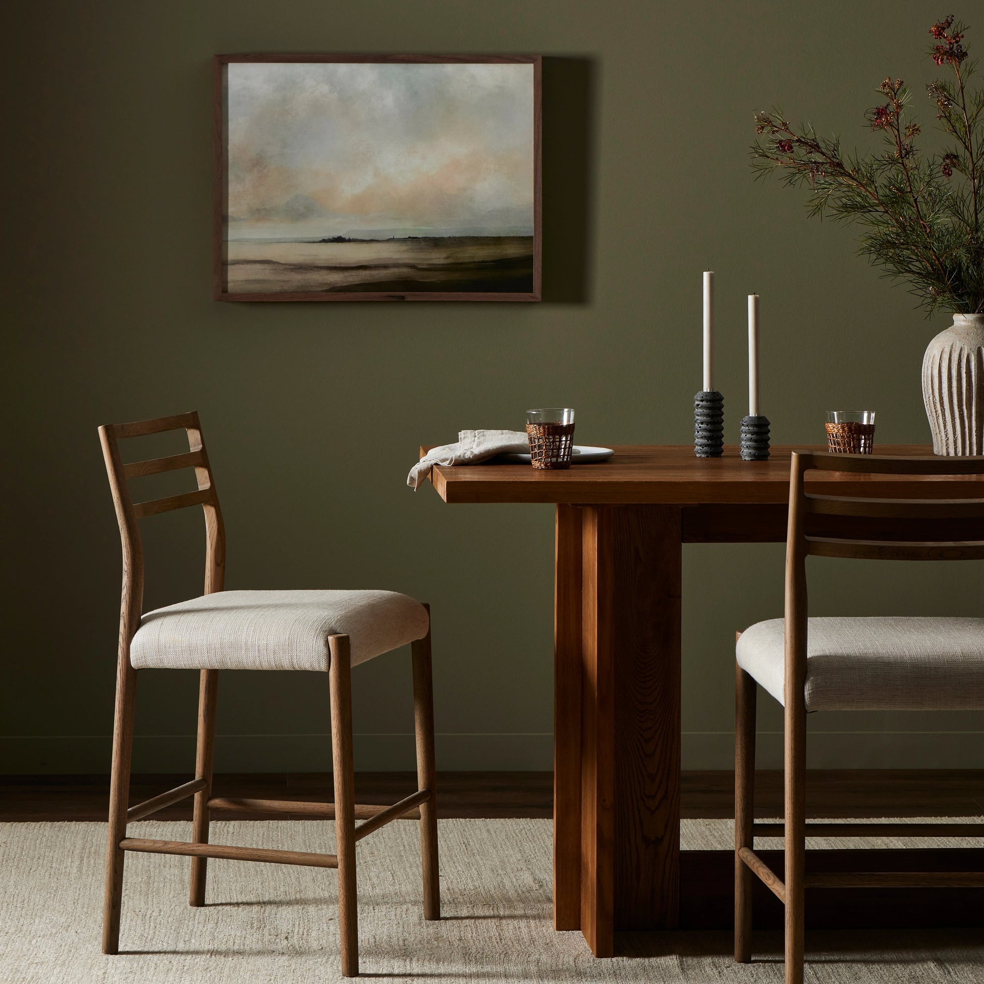 Glenmore Counter Stool by Four Hands in essence natural. Made from 49% viscose (rayon), 22% flax, linen, 18% polyester, 11% cotton, solid oak, 100% polyurethane foam pad in a modern style.