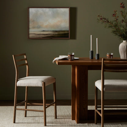 Glenmore Counter Stool by Four Hands in essence natural. Made from 49% viscose (rayon), 22% flax, linen, 18% polyester, 11% cotton, solid oak, 100% polyurethane foam pad in a modern style.