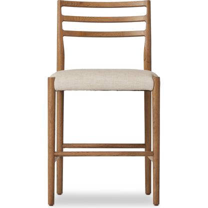Glenmore Counter Stool by Four Hands in essence natural. Made from 49% viscose (rayon), 22% flax, linen, 18% polyester, 11% cotton, solid oak, 100% polyurethane foam pad in a modern style.