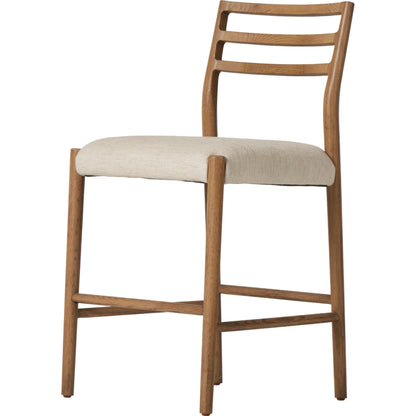 Glenmore Counter Stool by Four Hands in essence natural. Made from 49% viscose (rayon), 22% flax, linen, 18% polyester, 11% cotton, solid oak, 100% polyurethane foam pad in a modern style.