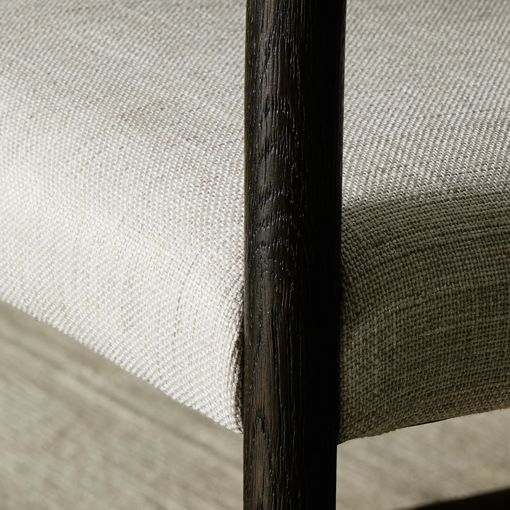 Glenmore Counter Stool by Four Hands in essence natural. Made from 49% viscose (rayon), 22% flax, linen, 18% polyester, 11% cotton, solid oak, 100% polyurethane foam pad in a modern style.