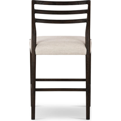 Glenmore Counter Stool by Four Hands in essence natural. Made from 49% viscose (rayon), 22% flax, linen, 18% polyester, 11% cotton, solid oak, 100% polyurethane foam pad in a modern style.