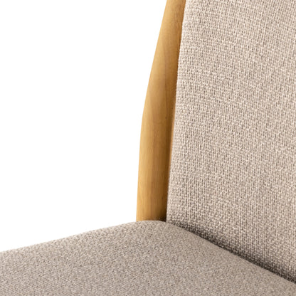 Hito Dining Chair by Four Hands in villa olive and burnished parawood. Made from 62% cotton, 20% flax, linen, 18% viscose (rayon), solid parawood, stainless steel in a transitional style.