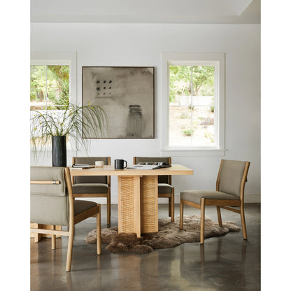 Hito Dining Chair by Four Hands in villa olive and burnished parawood. Made from 62% cotton, 20% flax, linen, 18% viscose (rayon), solid parawood, stainless steel in a transitional style.