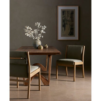 Hito Dining Chair by Four Hands in villa olive and burnished parawood. Made from 62% cotton, 20% flax, linen, 18% viscose (rayon), solid parawood, stainless steel in a transitional style.