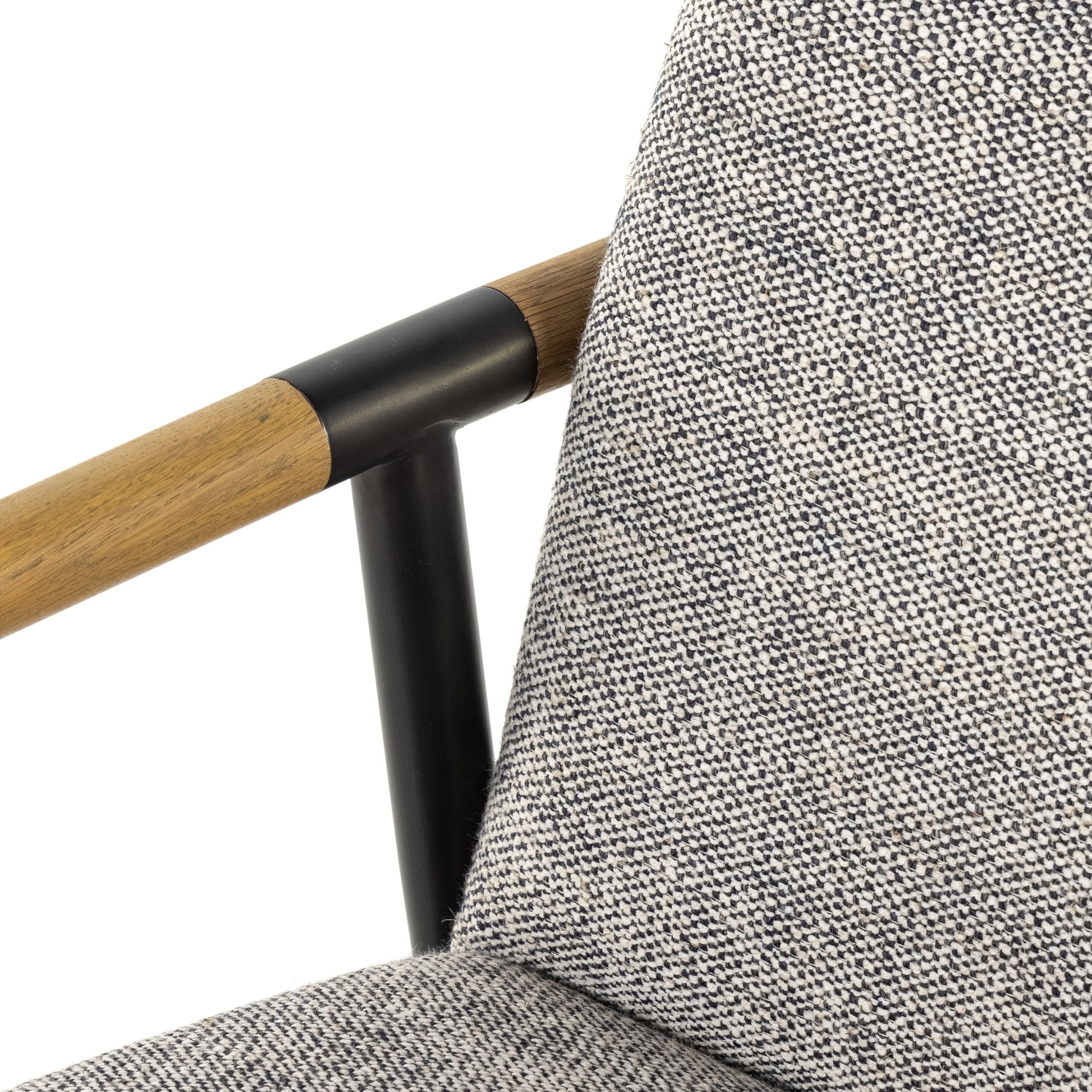 Rowen Dining Chair by Four Hands in thames raven, toasted oak, carbon black. Made from 66% polyester, 19% acrylic, 15% flax, linen, stainless steel, solid oak in a modern style.
