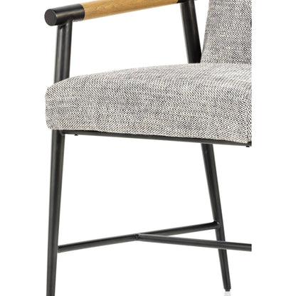 Rowen Dining Chair by Four Hands in thames raven, toasted oak, carbon black. Made from 66% polyester, 19% acrylic, 15% flax, linen, stainless steel, solid oak in a modern style.