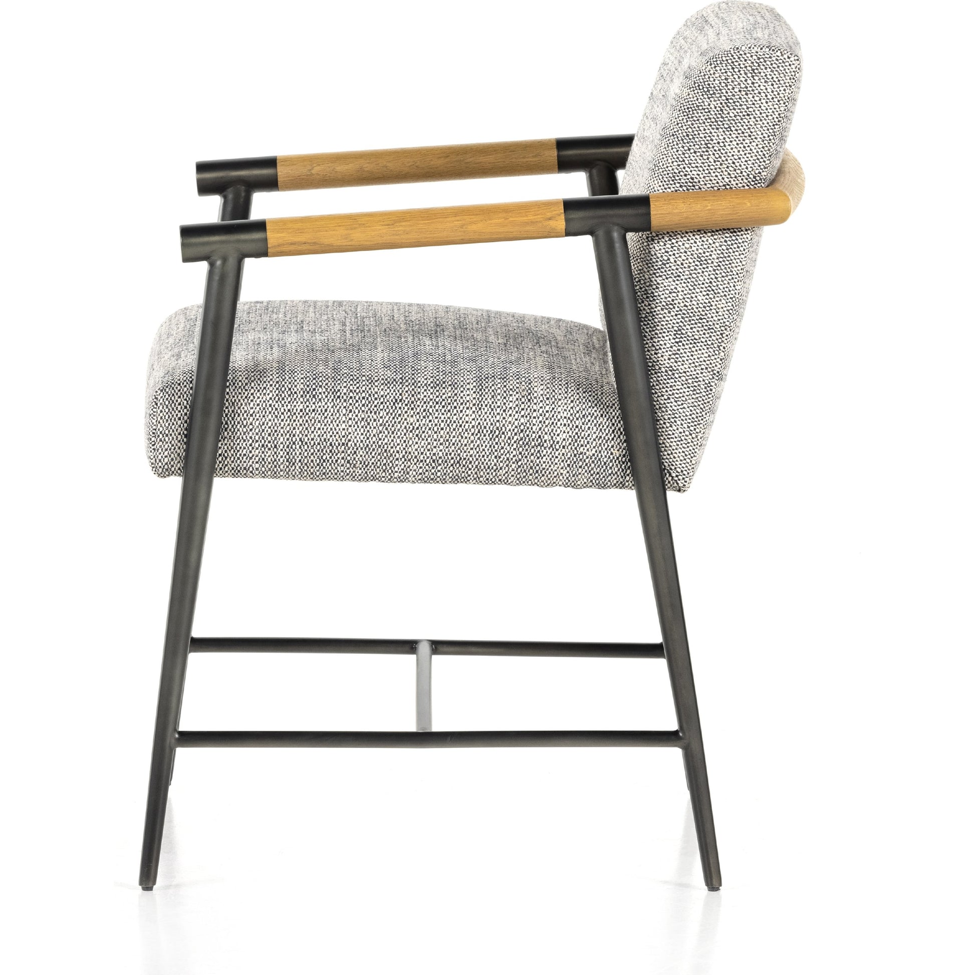 Rowen Dining Chair by Four Hands in thames raven, toasted oak, carbon black. Made from 66% polyester, 19% acrylic, 15% flax, linen, stainless steel, solid oak in a modern style.