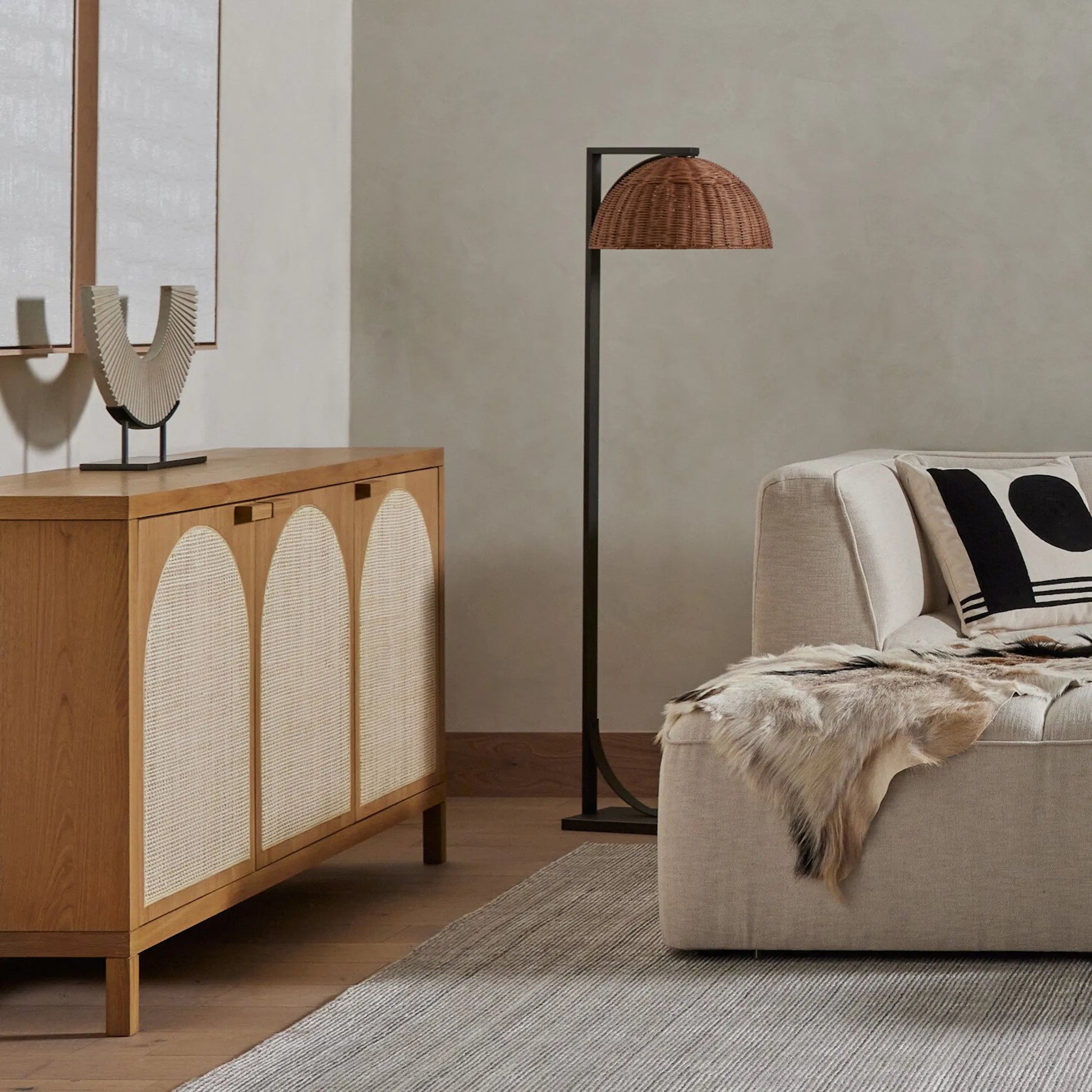Allegra Sideboard by Four Hands in honey oak, honey oak veneer, light natural cane and honey oak. Made from solid oak, oak veneer in a modern style.