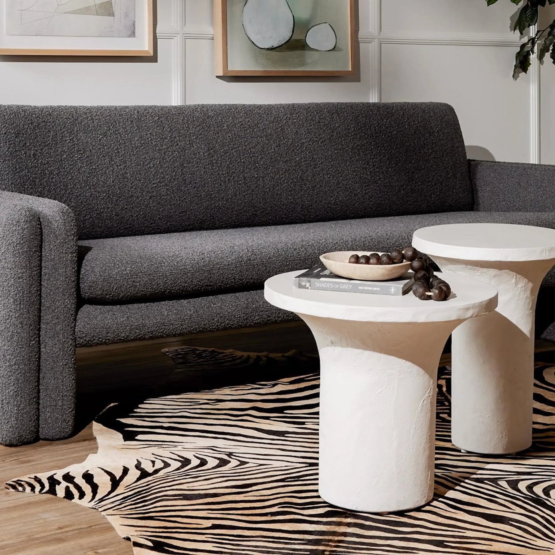 Parra Low End Table by Four Hands in plaster molded concrete, white concrete and white. Made from concrete in a modern style.