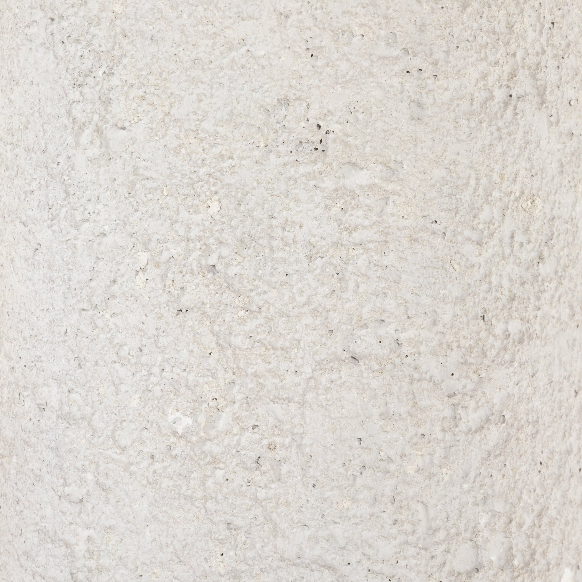 Otero Outdoor Round End Table by Four Hands in blanc white, matte white. Made from concrete in a modern style.