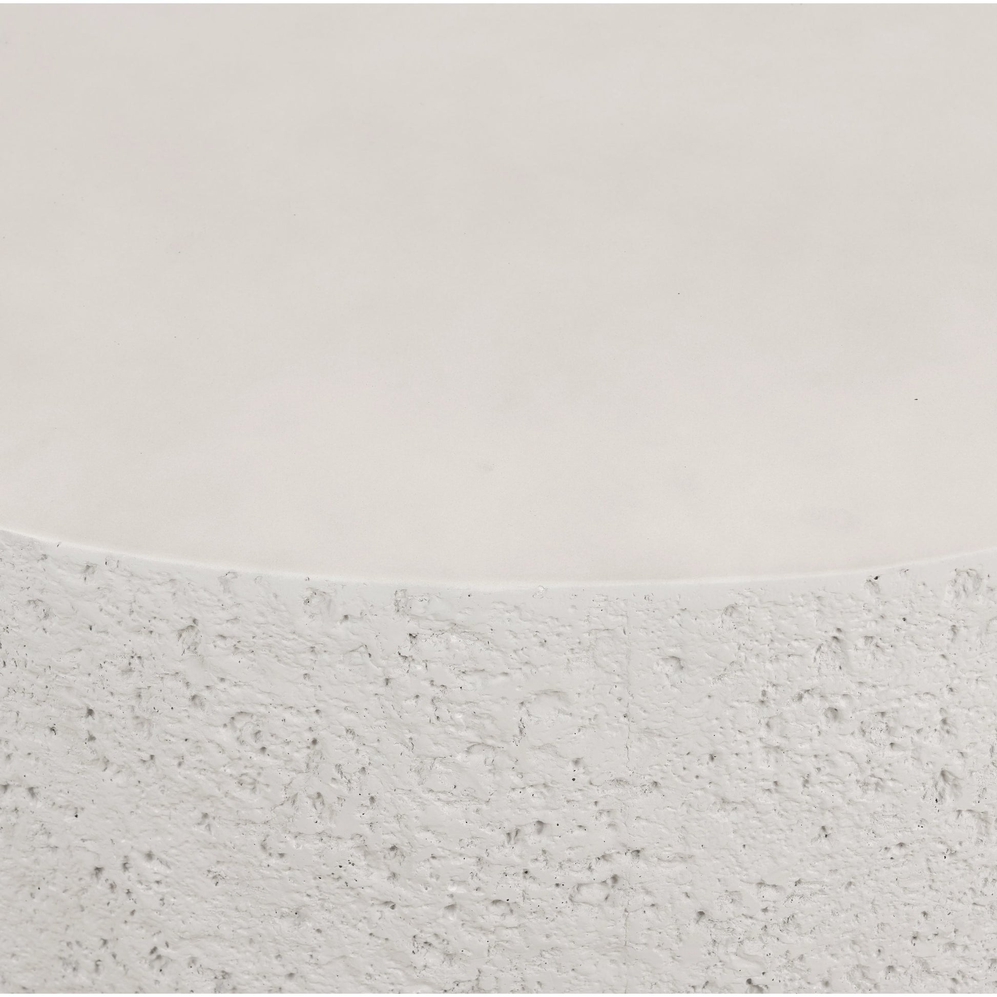 Otero Outdoor Round Coffee Table by Four Hands in blanc white, matte white. Made from concrete in a modern style.