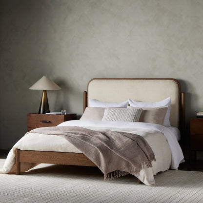Caroline Bed by Four Hands in kerbey ivory. Made from 96% polyester, 4% acrylic, solid oak in a rustic style.