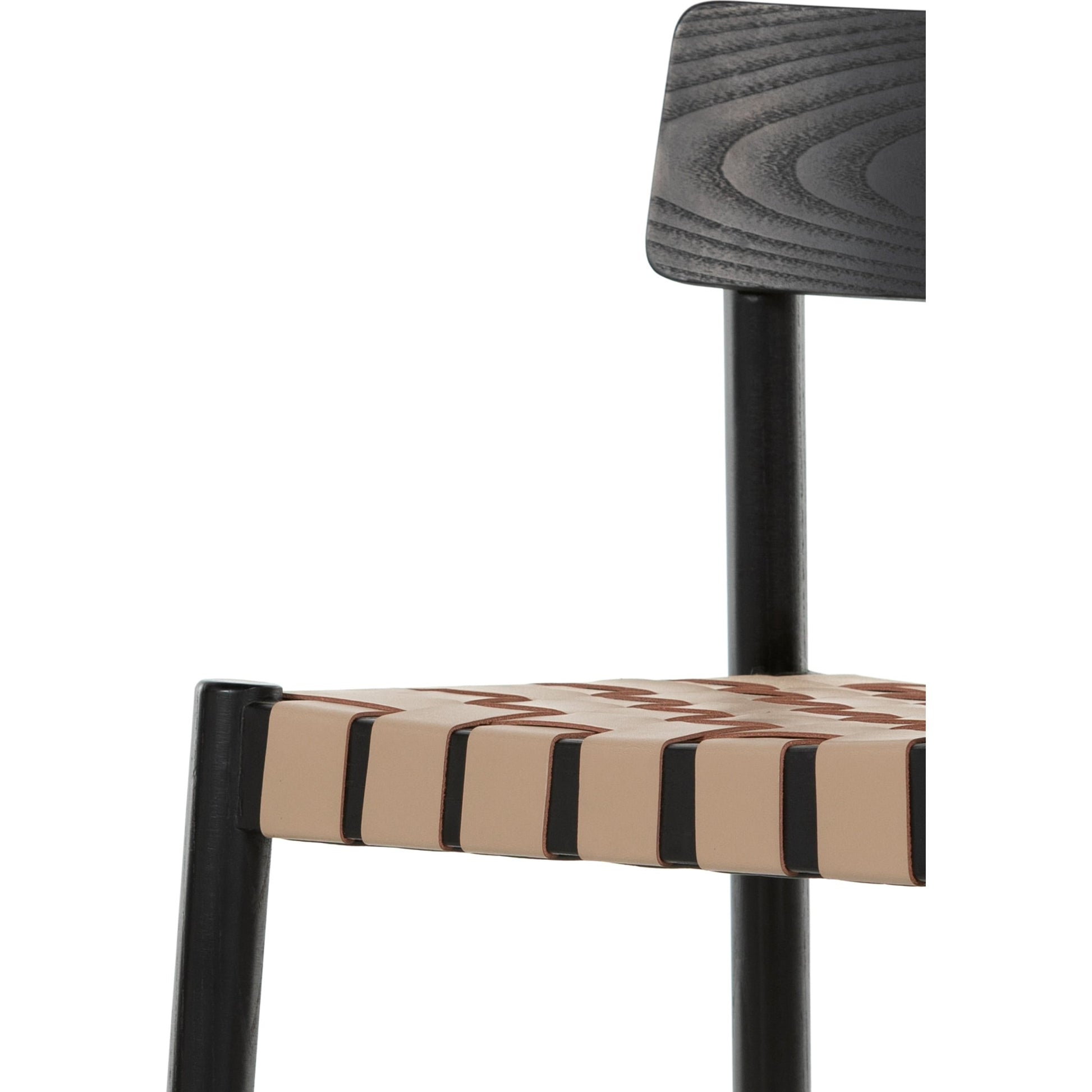 Heisler Dining Chair by Four Hands in almond leather and black. Made from solid ash, 70% split leather, 30% polyvinyl chloride (pvc), ash veneer in a modern style.
