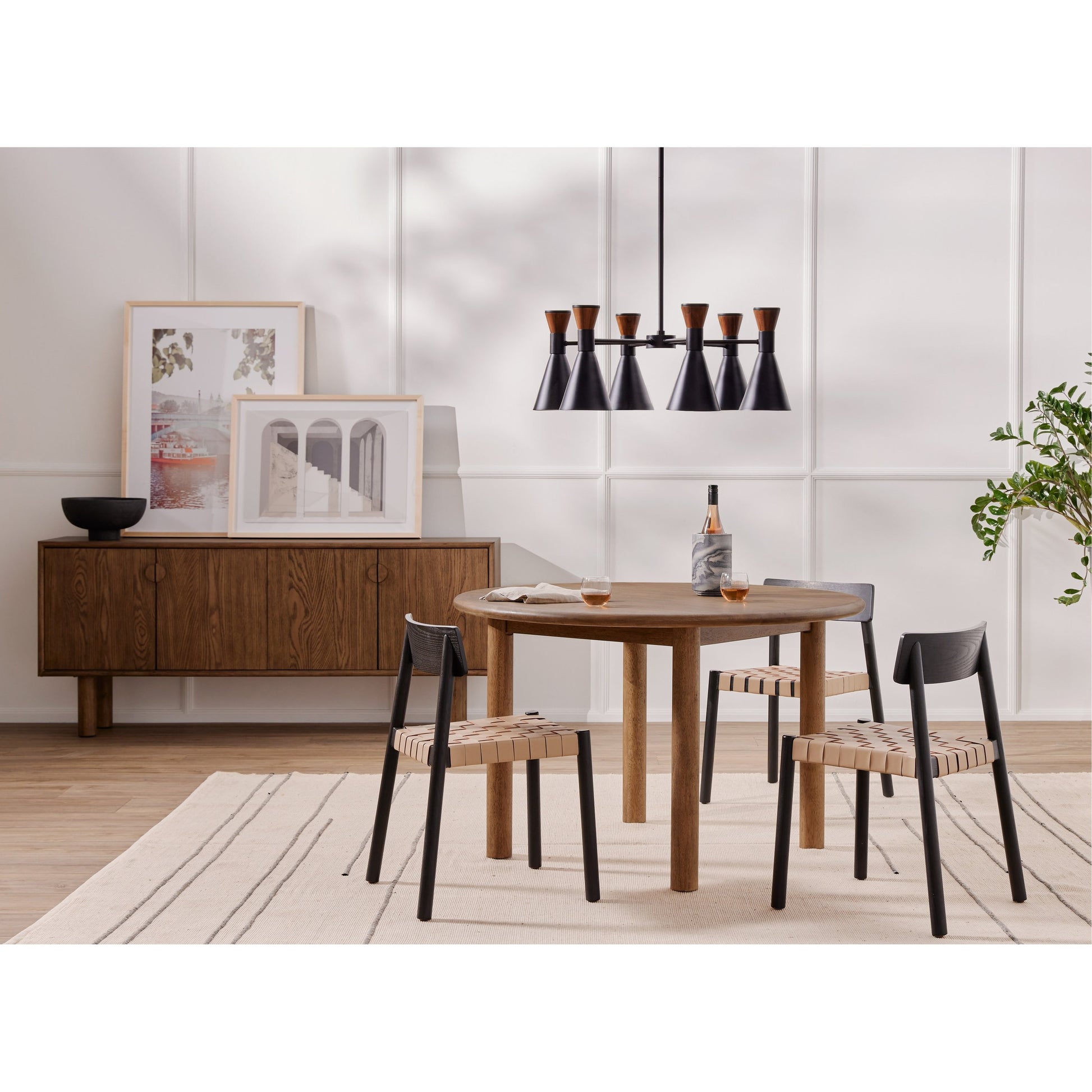 Heisler Dining Chair by Four Hands in almond leather and black. Made from solid ash, 70% split leather, 30% polyvinyl chloride (pvc), ash veneer in a modern style.