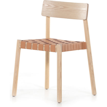 Heisler Dining Chair by Four Hands in almond leather and black. Made from solid ash, 70% split leather, 30% polyvinyl chloride (pvc), ash veneer in a modern style.