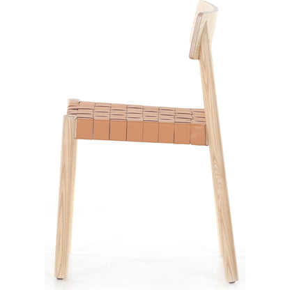 Heisler Dining Chair by Four Hands in almond leather and black. Made from solid ash, 70% split leather, 30% polyvinyl chloride (pvc), ash veneer in a modern style.