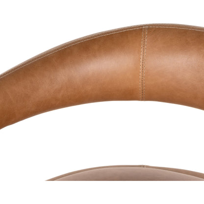 Hawkins Chair by Four Hands in sonoma butterscotch. Made from top grain leather, poplar plywood, 100% polyester in a modern style.