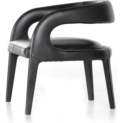 Hawkins Chair by Four Hands in sonoma butterscotch. Made from top grain leather, poplar plywood, 100% polyester in a modern style.