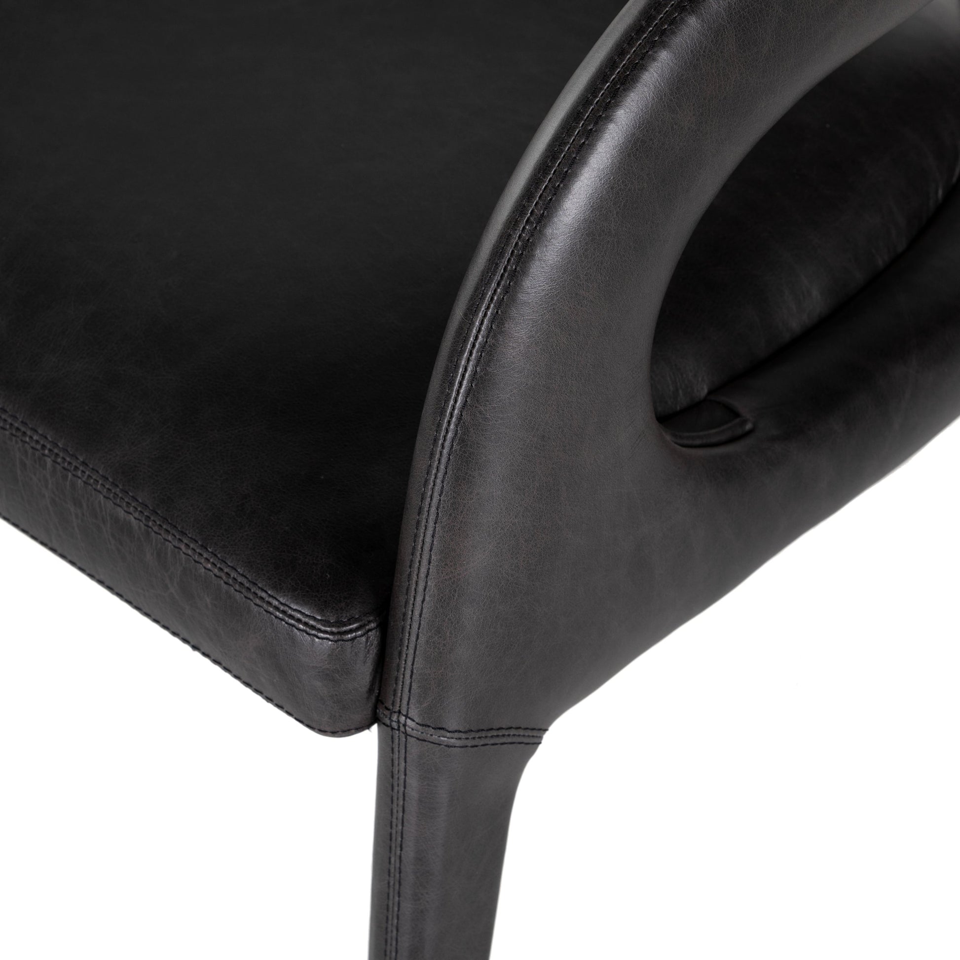 Hawkins Chair by Four Hands in sonoma butterscotch. Made from top grain leather, poplar plywood, 100% polyester in a modern style.
