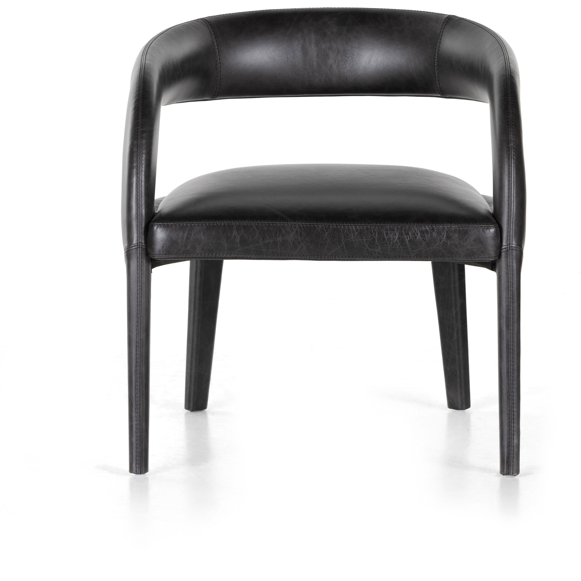 Hawkins Chair by Four Hands in sonoma butterscotch. Made from top grain leather, poplar plywood, 100% polyester in a modern style.