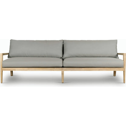 Amaya Outdoor Sofa by Four Hands in royal taupe and natural acacia. Made from solid fsc®-certified acacia, 100% polyester in a modern style.