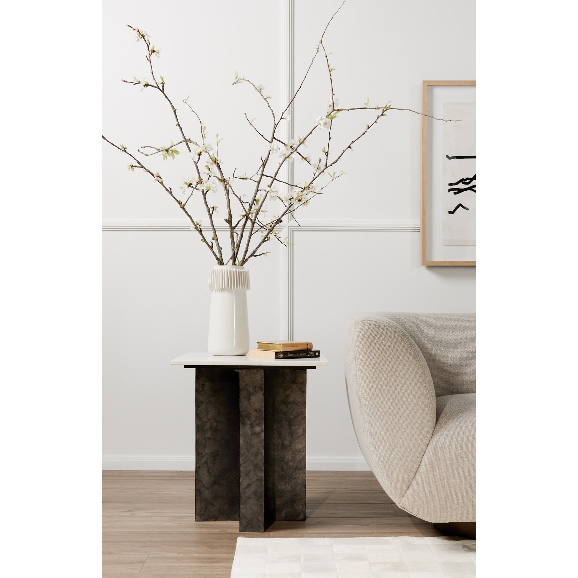 Terrell End Table by Four Hands in raw black, black marble. Made from solid marble, aluminum in a modern style.