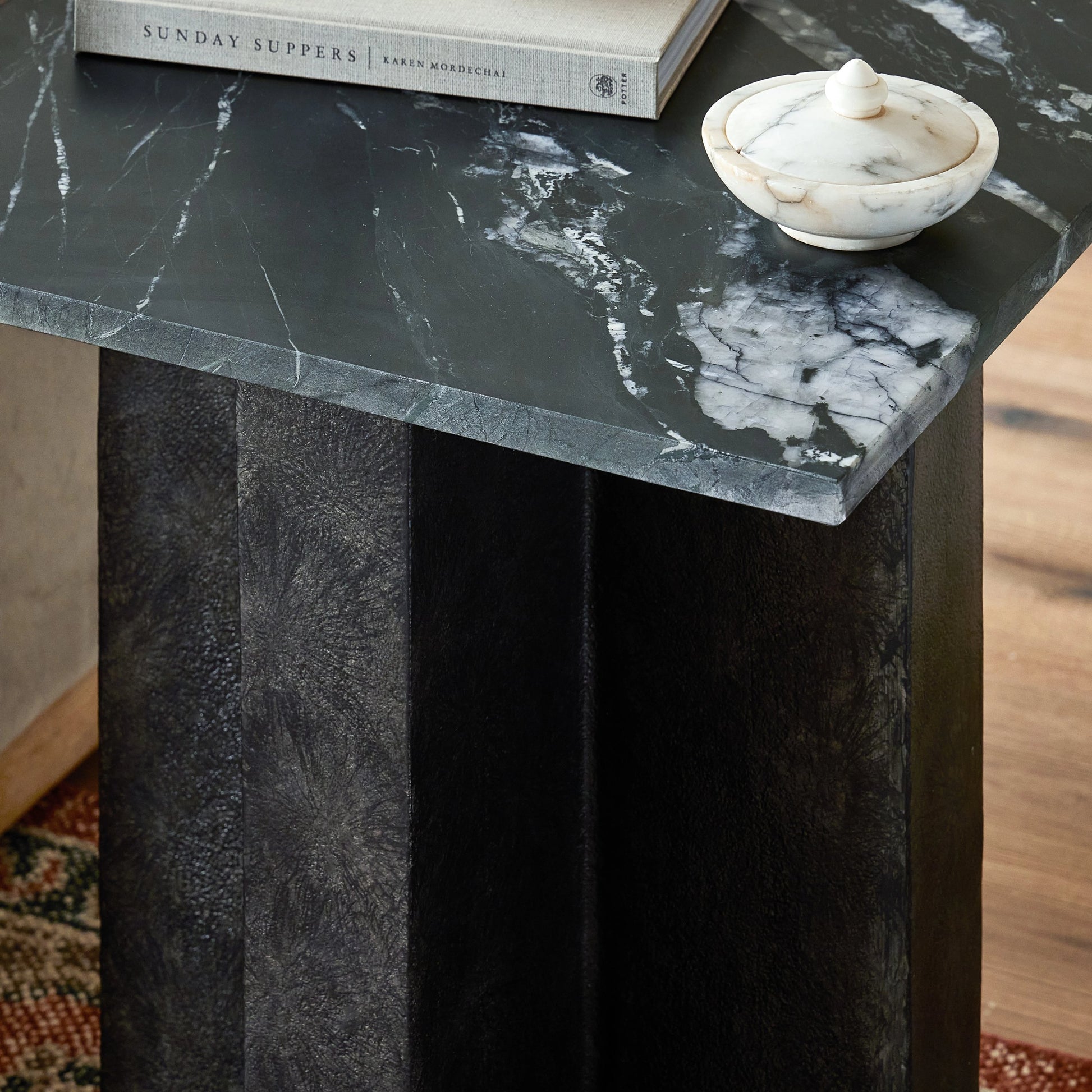 Terrell End Table by Four Hands in raw black, black marble. Made from solid marble, aluminum in a modern style.