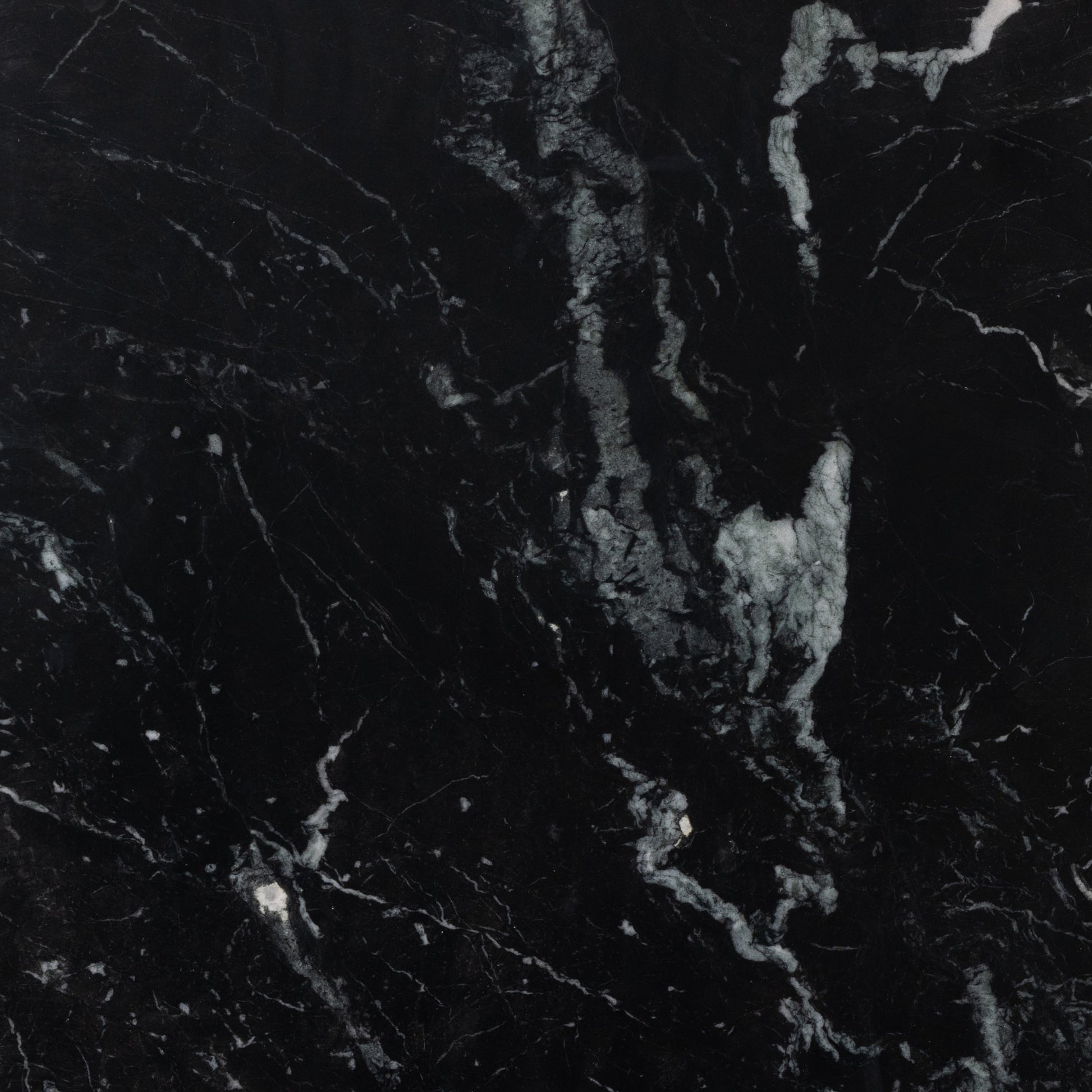 Terrell End Table by Four Hands in raw black, black marble. Made from solid marble, aluminum in a modern style.