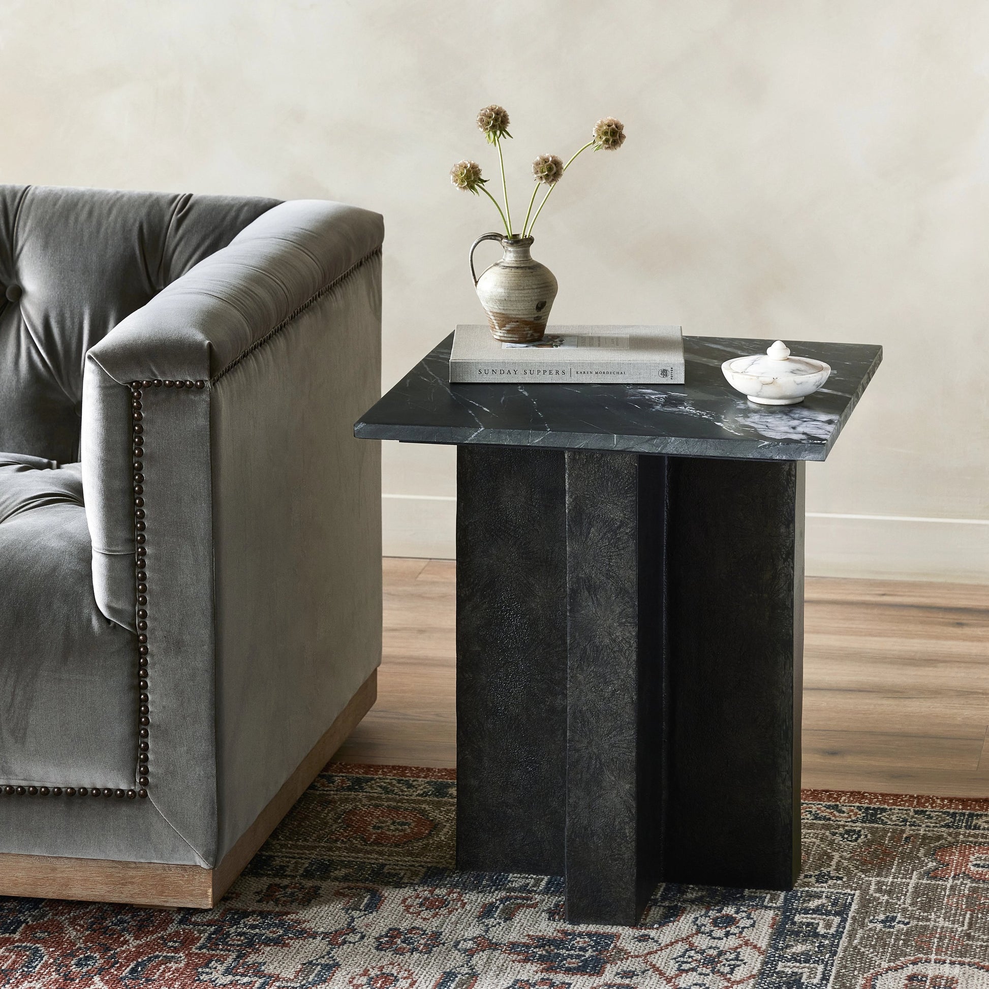 Terrell End Table by Four Hands in raw black, black marble. Made from solid marble, aluminum in a modern style.