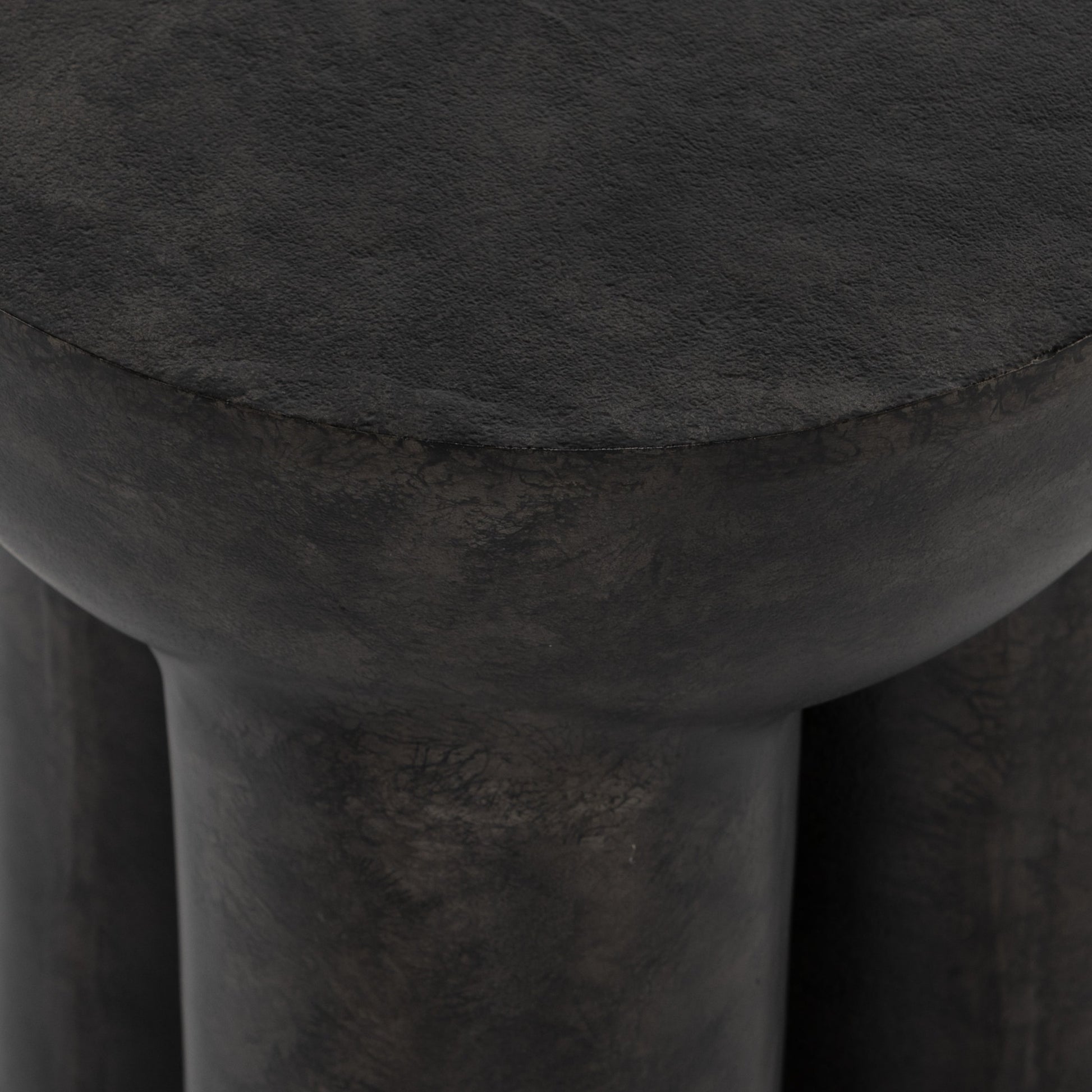 Sante End Table by Four Hands in raw black. Made from aluminum, engineered hardwood in a modern style.