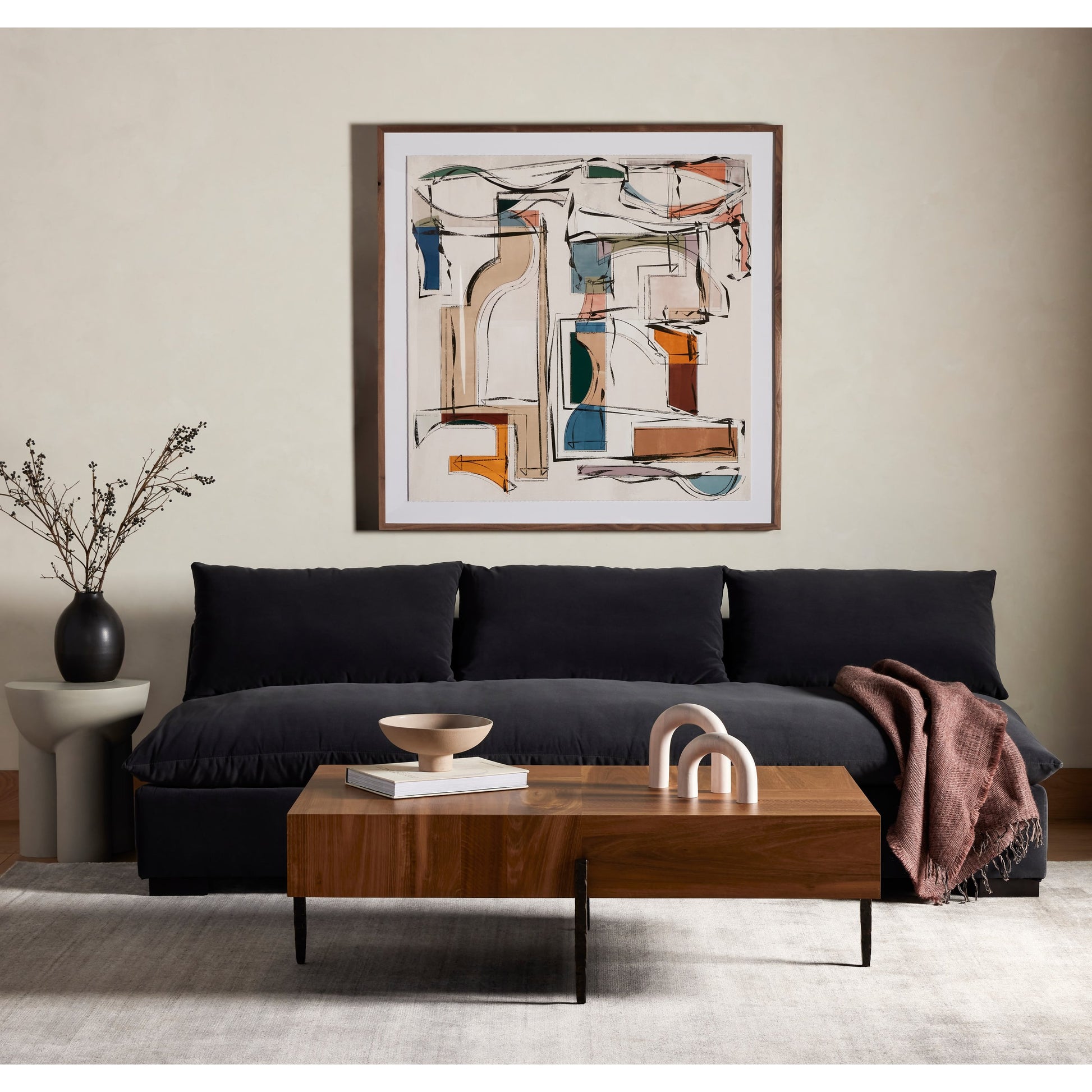 Sante End Table by Four Hands in raw black. Made from aluminum, engineered hardwood in a modern style.