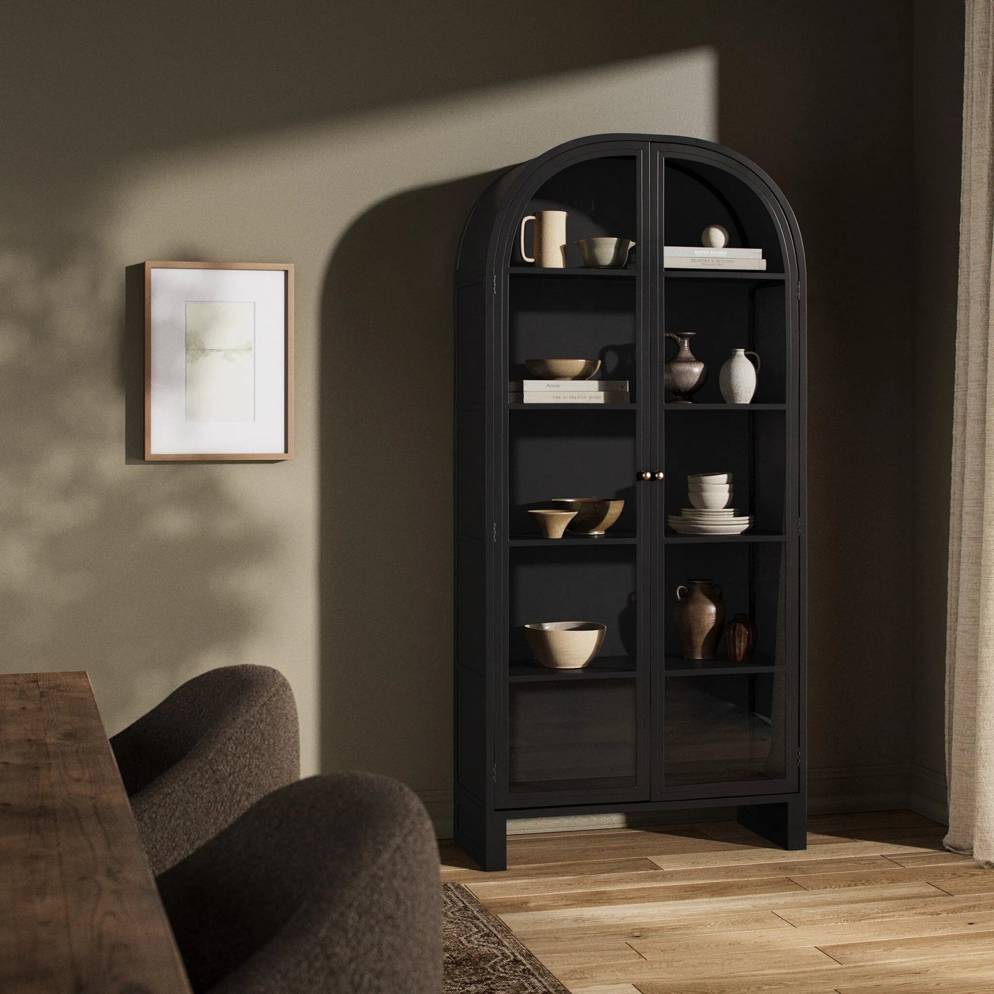 Breya Cabinet by Four Hands. Made from iron, tempered glass in a modern style.