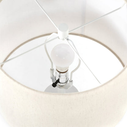 Innes Table Lamp by Four Hands in matte black. Made from aluminum, 60% polyester, 40% viscose (rayon) in a modern style.