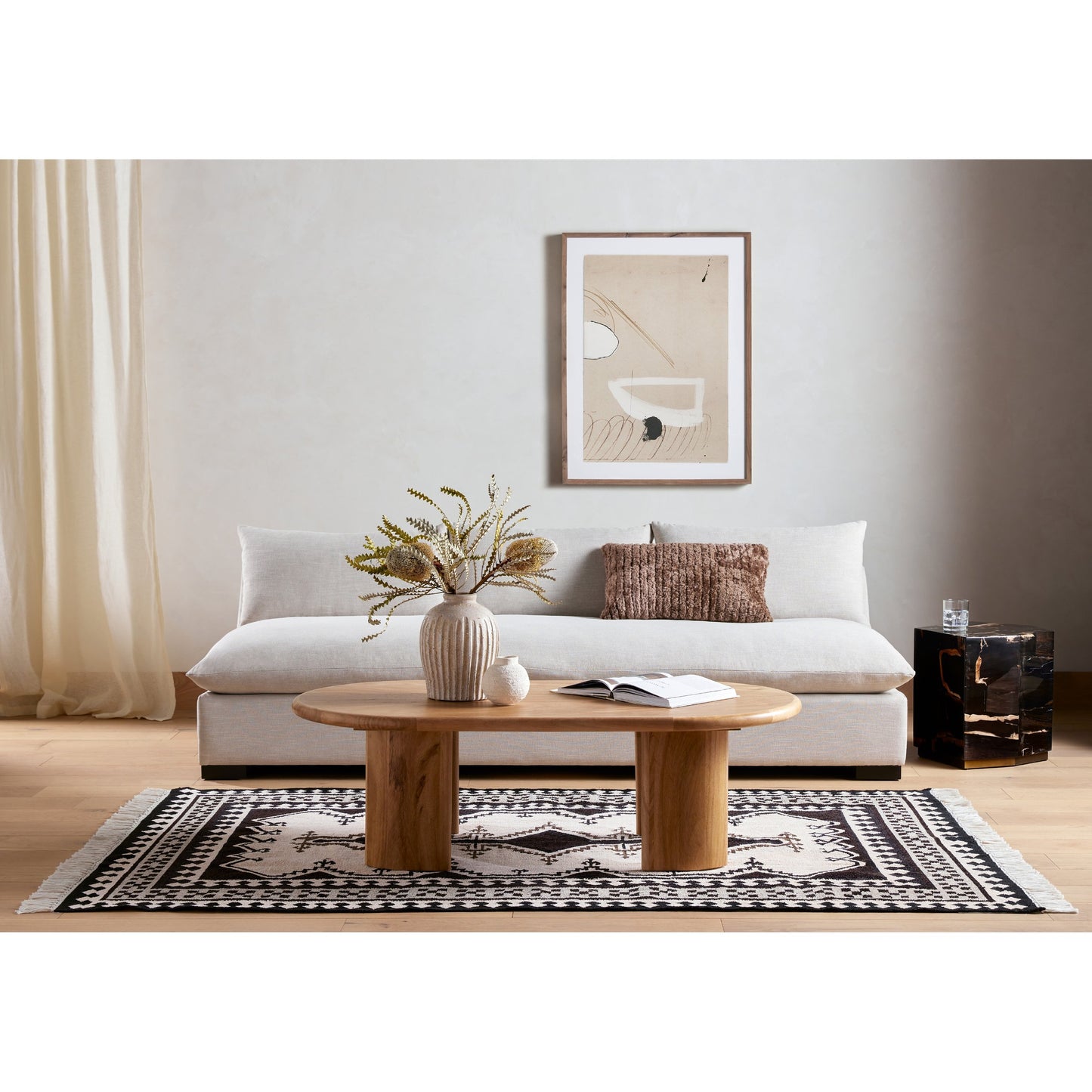 001 SI-1798289 | Lifestyle | Shep End Table by Four Hands in dark petrified wood, matte brass. Made from petrified wood, stainless steel in a modern style.