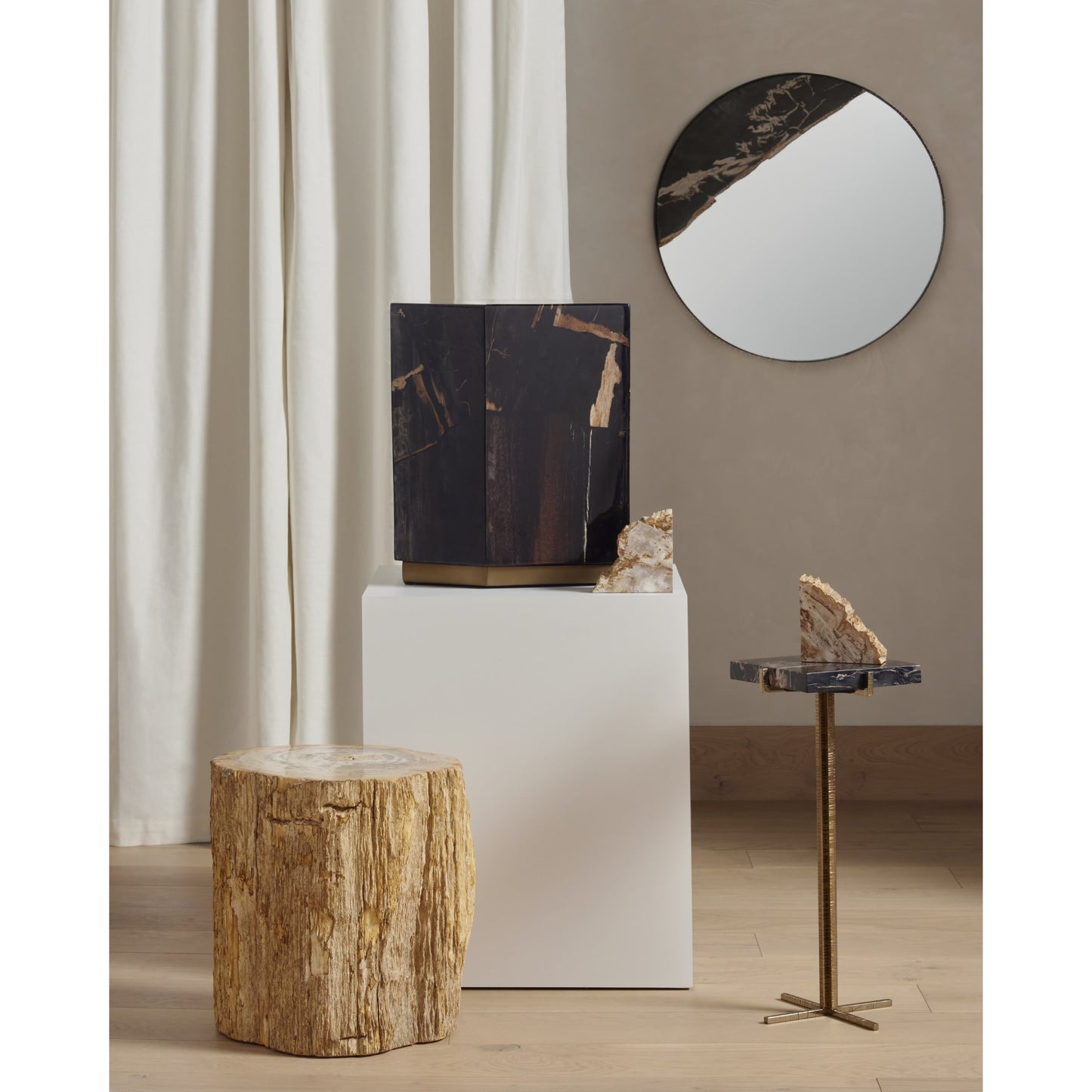 011 SI-1798289 | Lifestyle | Shep End Table by Four Hands in dark petrified wood, matte brass. Made from petrified wood, stainless steel in a modern style.
