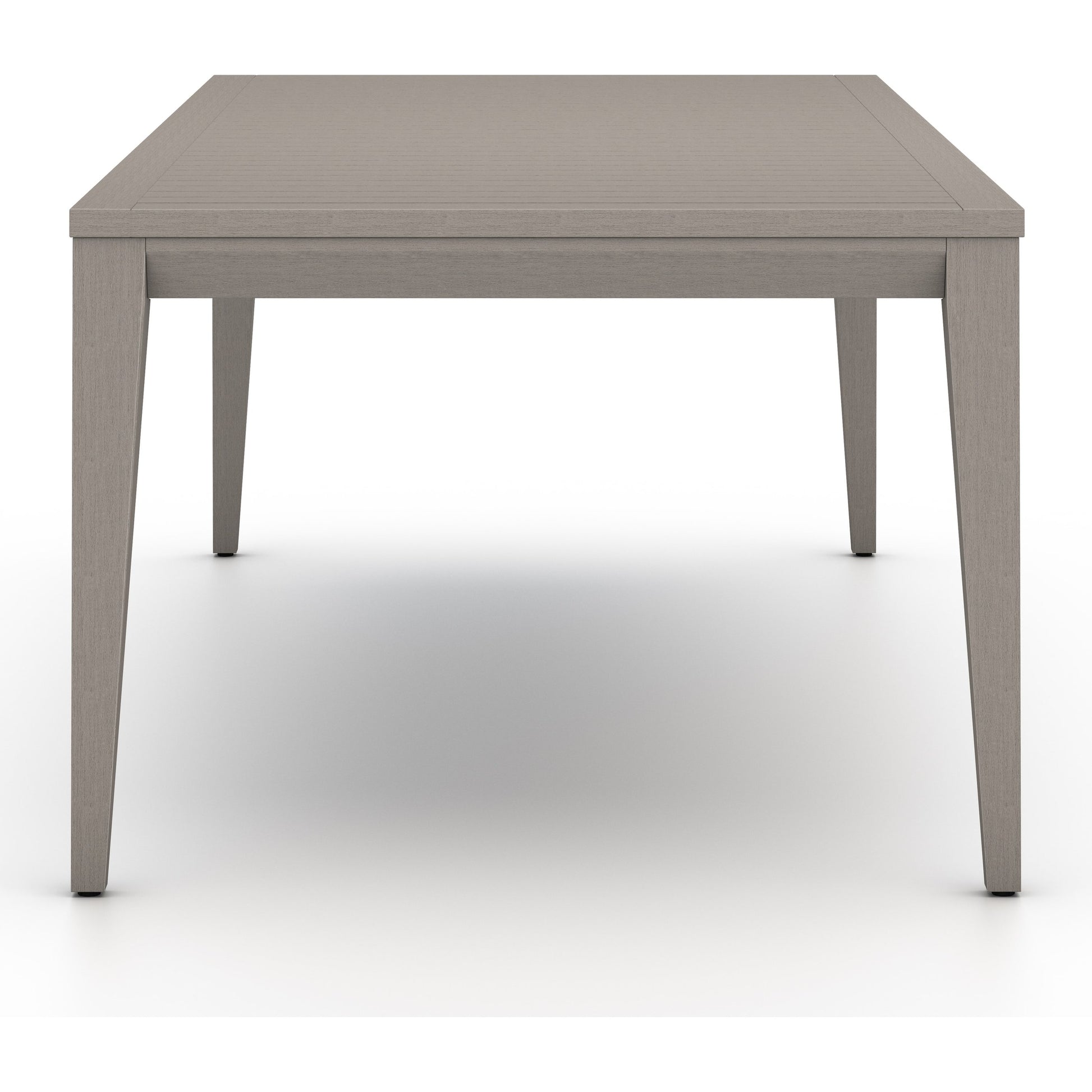 Sherwood Outdoor Dining Table by Four Hands. Made from solid fsc®-certified teak in a modern style.