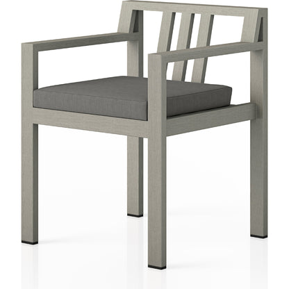 Monterey Outdoor Dining Armchair, Weathered Grey by Four Hands in weathered grey. Made from 100% olefin, solid fsc®-certified teak, 91% polyurethane foam pad, 9% polyester fiber batting in a modern style.