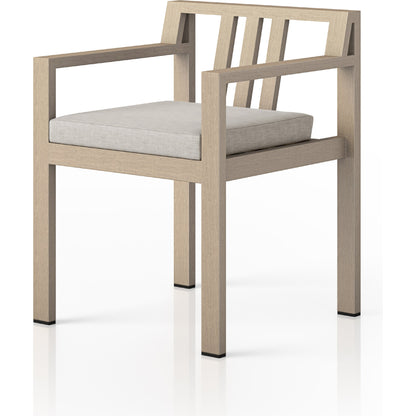 Monterey Outdoor Dining Armchair, Washed Brown by Four Hands in washed brown. Made from 100% olefin, solid fsc®-certified teak, 91% polyurethane foam pad, 9% polyester fiber batting in a modern style.