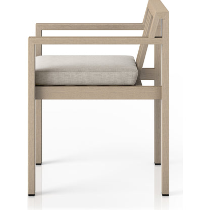 Monterey Outdoor Dining Armchair, Washed Brown by Four Hands in washed brown. Made from 100% olefin, solid fsc®-certified teak, 91% polyurethane foam pad, 9% polyester fiber batting in a modern style.