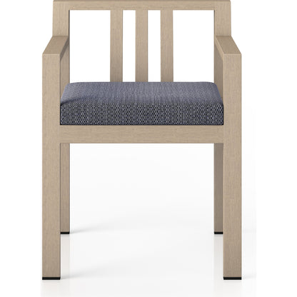 Monterey Outdoor Dining Armchair, Washed Brown by Four Hands in washed brown. Made from 100% olefin, solid fsc®-certified teak, 91% polyurethane foam pad, 9% polyester fiber batting in a modern style.