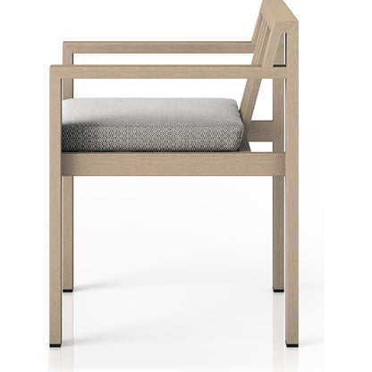 Monterey Outdoor Dining Armchair, Washed Brown by Four Hands in washed brown. Made from 100% olefin, solid fsc®-certified teak, 91% polyurethane foam pad, 9% polyester fiber batting in a modern style.