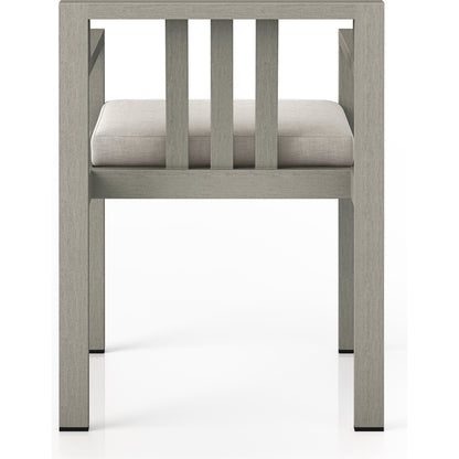 Monterey Outdoor Dining Armchair, Weathered Grey by Four Hands in weathered grey. Made from 100% olefin, solid fsc®-certified teak, 91% polyurethane foam pad, 9% polyester fiber batting in a modern style.