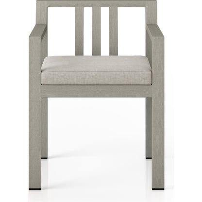 Monterey Outdoor Dining Armchair, Weathered Grey by Four Hands in weathered grey. Made from 100% olefin, solid fsc®-certified teak, 91% polyurethane foam pad, 9% polyester fiber batting in a modern style.