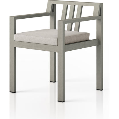 Monterey Outdoor Dining Armchair, Weathered Grey by Four Hands in weathered grey. Made from 100% olefin, solid fsc®-certified teak, 91% polyurethane foam pad, 9% polyester fiber batting in a modern style.